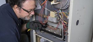 How to Fix a Noisy Furnace Power Vent | DoItYourself.com