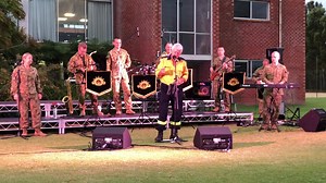 Kevin from the NSW Rural Fire Service jumped up to perform a song with the Band of the Royal Military College at their Bermagui fundraising concert last week. | Australian Army Band