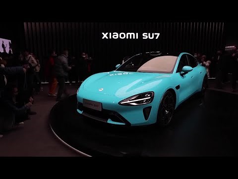 China's Xiaomi unveils first electric car | REUTERS