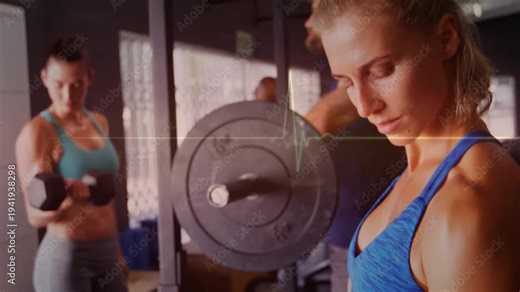 Camera framing woman in blue doing biceps curls in gym, hex dumbbell, ECG overlay for form