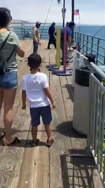 Santa Monica, California Pier Fishing. Fisherman caught huge fish!