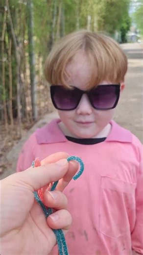 Snack strings tangled, game on, giggles never stop! #shorts #SnackTime #Fun