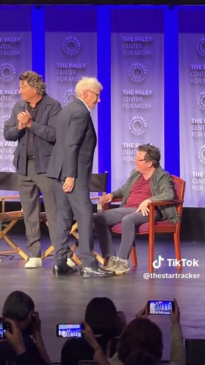 Harrison Ford gives a hug to his old friend Michael J Fox who made a surprise appearance at the Paleyfest panel for Shrinking. #harrisonford #michaeljfox #shrinking #paleyfest #tedmcginley
