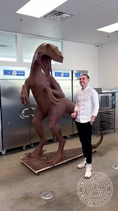 25M views · 663K reactions | Chocolate Velociraptor! 練 This 100% Chocolate sculpture is my biggest one yet, weighing 550lbs and stands 8ft tall. #amauryguichon #chocolate #raptor | Amaury Guichon | Facebook