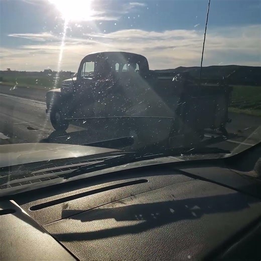 1950 Ford F1 Pickup Driving on Highway 1