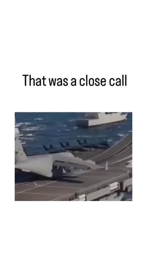 @its___pihu.ji on Instagram: "The post shares a 14-second AI-generated video depicting a U.S. Air Force C-5 Galaxy cargo plane accelerating down a ramp on an aircraft carrier, dipping perilously low over the ocean before pulling up, captioned 'That was a close call.' Factually impossible: Aircraft carriers launch fixed-wing planes via steam catapults, not ski-jump ramps, and the C-5's 222-foot wingspan exceeds standard carrier deck widths of about 150 feet, per U.S. Navy specifications. Viral re