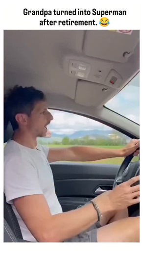 @memefory0u_ on Instagram: "The video showcases a humorous and heartwarming interaction where a younger man is driving, and an older man, presumably his grandfather, playfully pretends to lift the car from outside, mimicking the trope of superhuman strength often attributed to grandparents in emergency situations, as seen in real-life examples like Angela Cavallo lifting a car to save her son in 1982. This scene taps into the cultural phenomenon of "hysterical strength," where individuals, often