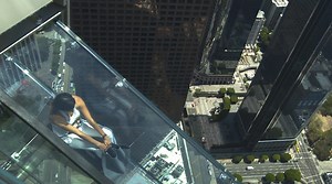 Take the plunge down this 36-foot glass slide in Los Angeles! | In The Know