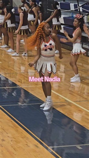 This is Nadia, our little firecracker!!!She is always filled with energy and a dancing macine!!! We started the phenomenon in our county of "throwing counts" during timeouts, which is dancing to 8 counts. The team doesn't know which combination of 8 counts the leader is going to showcase until they step forward, and then they follow the leader. As you can see our squad is always trained and ready to go. Everyone in the county has started doing the 8 counts during time outs now, so if you're loca