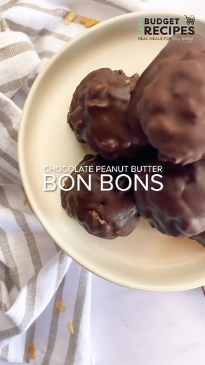 In love with these Chocolate Peanut Butter Bon Bons! #easybudgetrecipes #chocolate #nobakedesserts #easydesserts #chocolatepeanutbutter #bonbons #peanutbutterbonbon #valentinesdaydesserts | Easy Budget Recipes