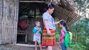 Hoeing soil for gardening. single mother's daily work, Building New Life | Reid Baker