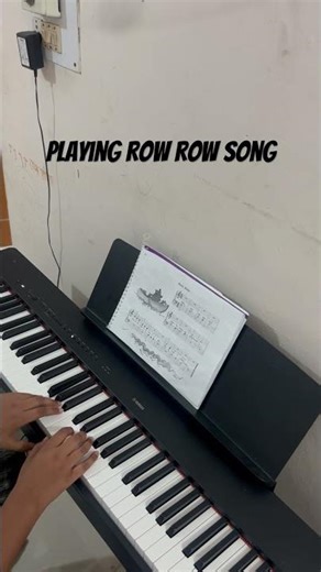 Playing the row row song on piano 🎹 # music # youtubeshorts