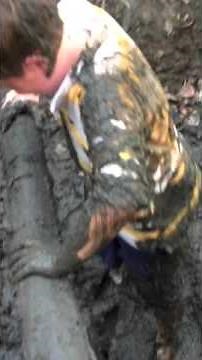 Hilarious video of boy falling in a mud pit