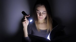 Close Portrait Smart Girl Sits Flashlight Stock Footage Video (100% Royalty-free) 1024853786 | Shutterstock