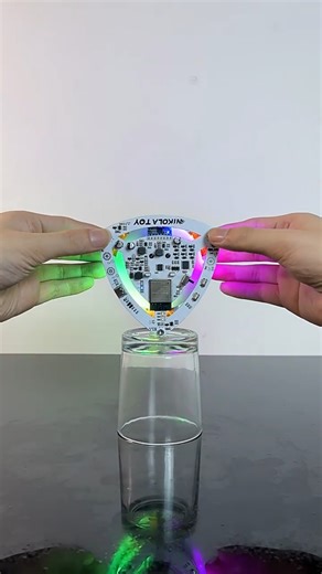 3.9M views · 2.7K reactions | Experience the magic of physics in motion! ⚙️✨ The NikolaToy Self-Balancing Lelo Triangle showcases the conservation of angular momentum in a mesmerizing high-tech display. A perfect blend of science and art for your desktop!   A must-have for science lovers, curious minds, and unique décor enthusiasts. Shop Now: https://ban.ggood.vip/15GN2 #banggood #toys #deskdecor | Banggood | Facebook