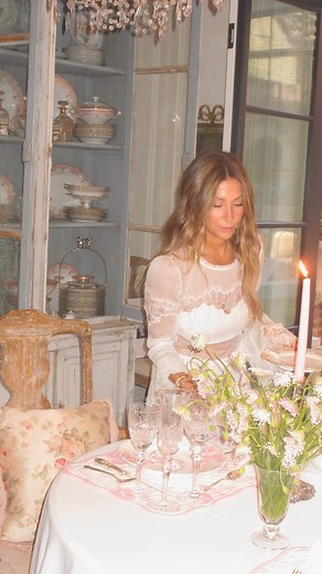 LoveShackFancy  on Instagram: "LoveShackFancy furniture is finally here! La Vie En Rose Chair is part of our debut collection for @potterybarn main line and we’re in love  Our founder @becknyc adds the finishing touches to her dining room with our iconic La Vie En Rose floral chairs and matching china from the new LoveShackFancy x Pottery Barn collection. Romantic, ruffled, pink and oh-so-dreamy.  #LoveShackFancyxPotteryBarn"