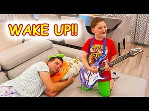 Children try to Wake Sleeping Father with Pretend Play Music Toys!