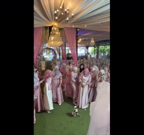 Bridesmaids all avoid catching the bride's wedding bouquet