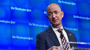 Amazon CEO Jeff Bezos' net worth tops $150B as he becomes richest person in modern history