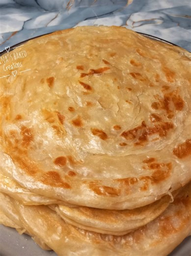 Flaky Roti Recipe Ingredients: 4 cups cake flour 1 teaspoon salt 1 cup boiling water ½ cup room temperature water Oil for coating ,layering and cooking Butter/margarine (optional) #flakyroti #roti #recipe #food #lifestyle