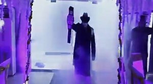 Groom makes Undertaker-inspired entrance at wedding