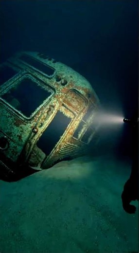 Diver Opens an Old Bus Underwater… A Giant Monster Emerges
