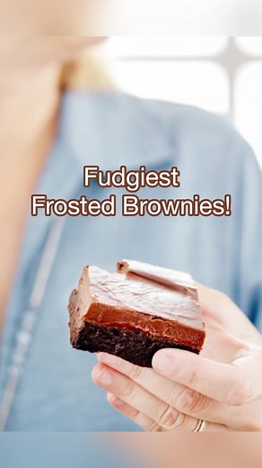 My favourite Fudge Brownie recipe to date and the full recipe is right here for you! What makes it my favourite? The density of the brownie itself, and the boiled frosting which is made similarly to making fudge itself. I add a little espresso powder to the frosting for extra kick, but you could certainly leave it out. Make these brownies your new favourite. #brownies #bakingwisdom #annaolson #annaolsonrecipe #fudgebrownies