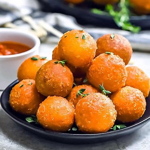 2.1K views · 103 reactions | HELLO, CHEESE LOVERS! 燎 At parties, cheesy appetizers are always a hit. These cheese balls, with their crisp outside, airy inside, and smoky flavor are no exception. They take only 30 minutes to put together, and they’re absolutely addictive. GET THE RECIPE AT https://hostthetoast.com/5-ingredient-crispy-smoked-gouda-cheese-balls/ | Host The Toast | Facebook