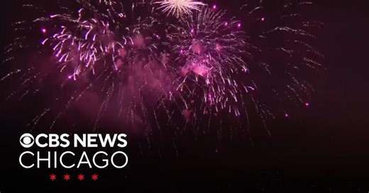 Chicago celebrating the new year with downtown fireworks, big parties