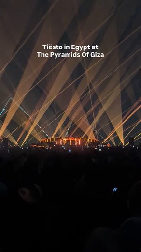 Cairo Spots on Instagram: "Tiësto is live at the Pyramids of Giza. The Giza Plateau has fully transformed, with the pyramids glowing behind the stage and the crowd locked into the moment. Sound rolls through the desert, lights cut across the night, and the scale of the setting turns every second into something bigger than a typical show. A night where Cairo hosts global electronic music at one of the most powerful locations in the world, happening right now under the pyramids. Follow @cairospots