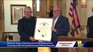 Hogan honors ASL interpreter Jimmy Beldon