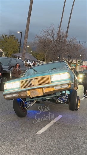 Custom Painted, Chrome, Gold and Engraved Buick Regal G Body Lowrider cruising 3 wheel motion in Pasadena, California! 😎 | Skid Society