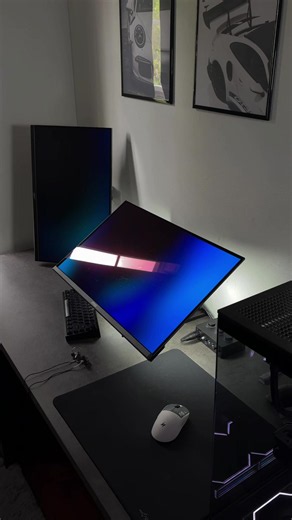 Minimalist Black PC Setup with OLED Monitor