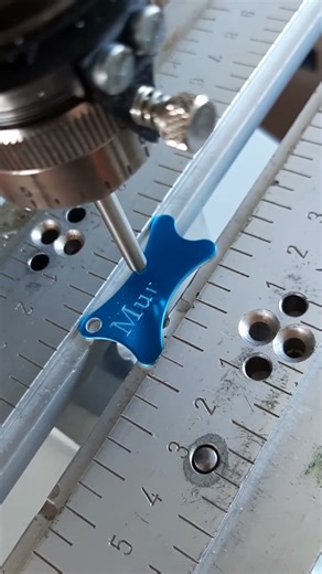 Engraving a bone shaped pet tag