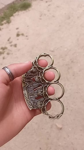 Intricate Brass Knuckle Duster Design Showcase