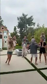 family fun with pass the ball shoulder ride game