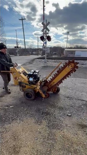 GovDeals: 2006 Vermeer RT100 Walk Behind Trencher w/ Trailer