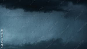 Storm with heavy rain and dark black clouds. Timelapse of a storm. 4k stock video footage. Rainfall. Rainy day. Dramatic nature.