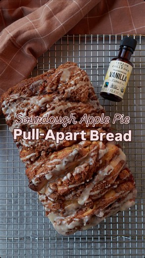 Emily Christensen | Easy Sourdough Recipes & Tips on Instagram: "If you’re hosting Thanksgiving this year, this Sourdough Apple Pull-Apart Bread with Vanilla Icing needs to be on your menu. It starts with a soft, fluffy enriched dough made with active sourdough starter, layered with warm spiced apples, and sprinkled with a buttery cinnamon streusel. Then the whole loaf gets finished with a sweet vanilla icing. And can we talk about the vanilla for a second? I’ve been using @taylorandcolledge Org
