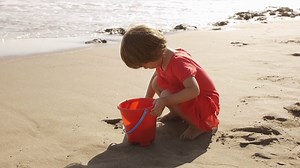 Child Enjoying Beach Playtime Stock Footage SBV-300560315 - Storyblocks