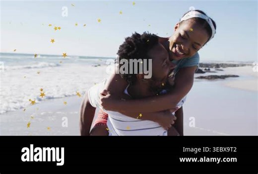 Woman hopping onto man's back, man supporting and walking shoreline, stars floating, travel romance. Couple, beach, piggyback, playful, ocean, confetti, joyful Stock Video Footage - Alamy