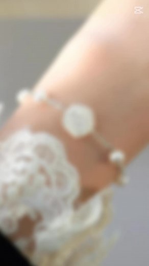 She wore elegance like a flower on her wrist. 🌸French retro charm meets real freshwater pearls — this bracelet is a soft whisper of timeless beauty. 🛒 Tap to shop → https://shorturl.at/ZDfp4 | PEARL ARTISTRY