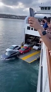 27K views · 92 reactions | CARS JUST ROLLING INTO THE OCEAN… BRO WHAT?!  The ferry tilted, the gate opened — и всё… Cars started sliding straight into the water one by one while people watched in total shock. Nothing they could do except film the chaos. Unreal. #wow #ai #fail #really #crash #ferry #car #wtf #ocean #viralvideo #sea #ship #what #no #shit #sos #news | The.worldai | Facebook