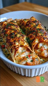 Creamy Garlic Parmesan Shrimp Roll-Ups Golden baked tortillas encase a rich shrimp and cheese filling reminiscent of classic Alfredo, finished with a crisp exterior and paired with a warm garlic butter dipping sauce. Careful seasoning and gentle baking create contrast between creamy interiors and delicately crisp shells. 🛒Ingredients : The Roll-Ups: 8 large flour tortillas, soft taco size 1 lb cooked shrimp, peeled, deveined, and chopped into chunks 2 cups shredded mozzarella cheese 1/2 cup Par