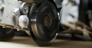 A close up of a machine that is grinding metal