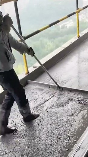 Smoothing process of cement floor with a scraper