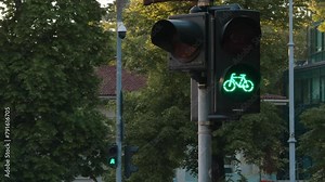 Switching green do red traffic light. Red bike pedestrian traffic light. Close up photo with a traffic light showing that it is forbidden to cross the street 4k video.