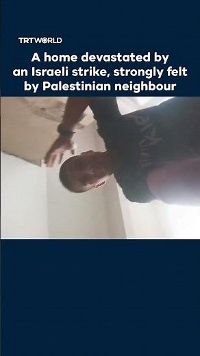 Palestinian neighbour records the moment of a huge explosion as Israel targets a home in Gaza City