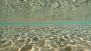 Sand underwater surface on the sea shore, Mediterranean sea, natural scene, Spain