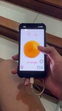 Chen Chen is copying the Alphabet using the Holiday Educationist App on the phone. #abckids